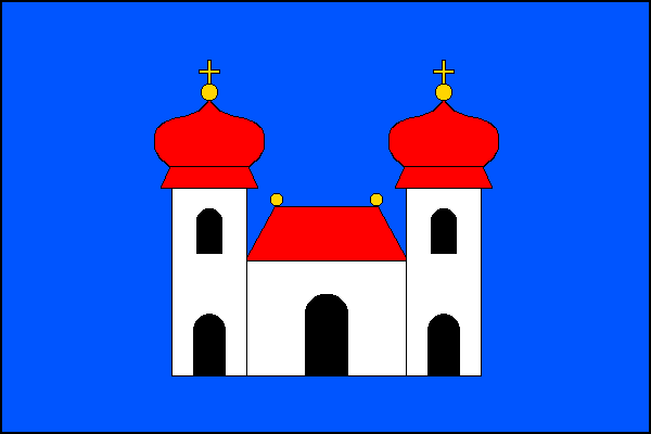 Modrý list s bílou budovou s prolomenou černou branou a s červenou valbovou střechou se dvěma žlutými makovicemi. K budově přiléhají dvě bílé věže, každá s prolomenou černou branou, černým obloukovým oknem a červenou bání se žlutou makovicí s křížkem. Pom